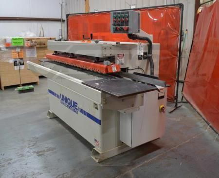 A machine that has the word unique on it