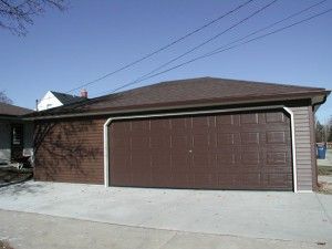 Completion of a custom Classic Builders Deluxe Hip style garage.