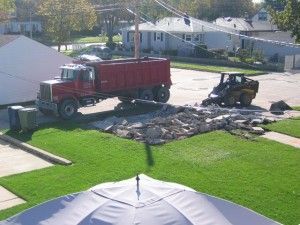 Removal of old garage slab.