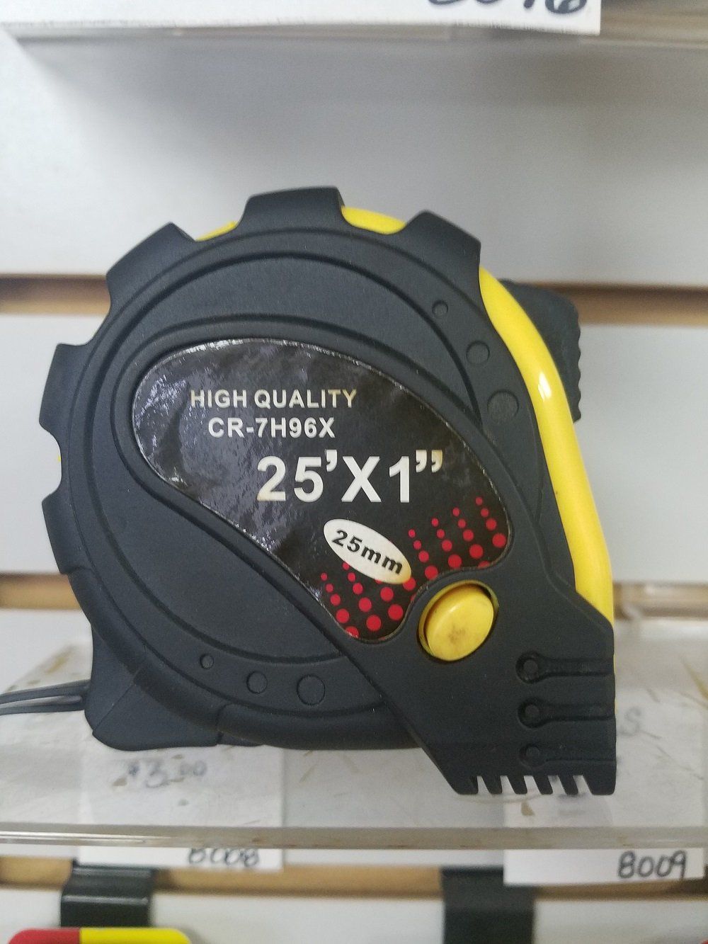 Black and yellow tape measure, labeled