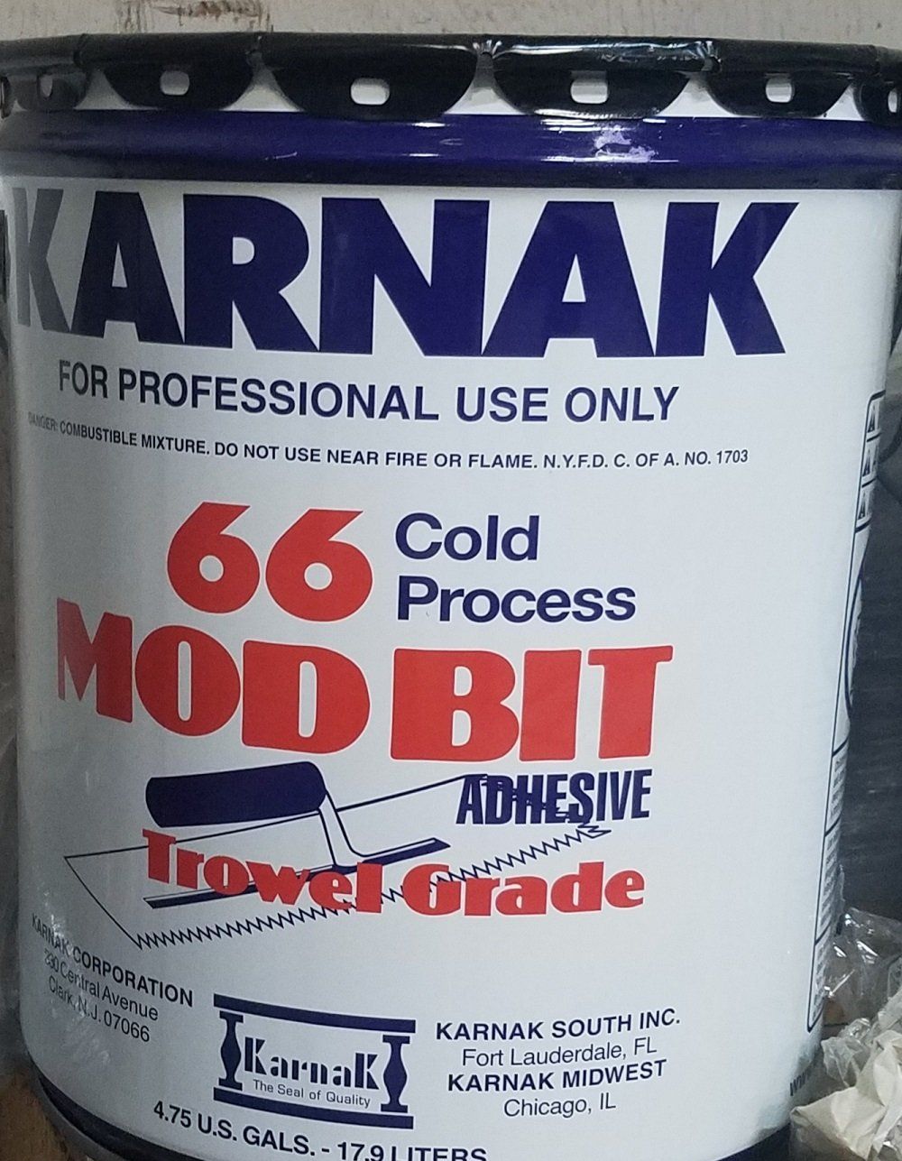 White bucket of Karnak 66 Mod Bit adhesive. Blue and red text.