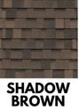 Brown asphalt roof shingles, varying shades of brown.