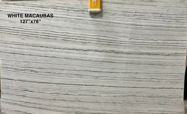 White wood-grain tile sample labeled “WHITE MACAUBAS” on display