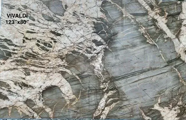 Gray and white marble slab with dramatic veining and a Vivaldi 123 x 240 label in the corner