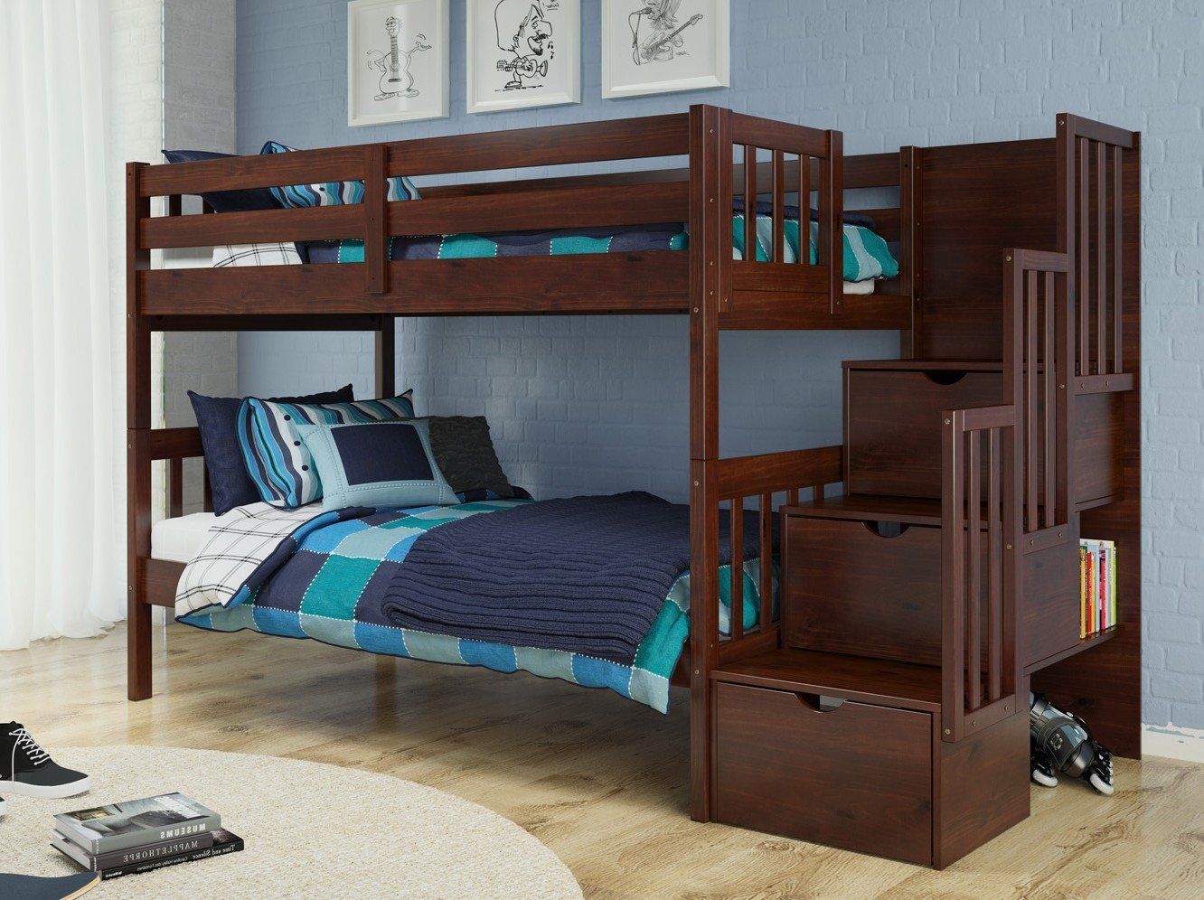 A bunk bed with stairs leading up to it in a bedroom.