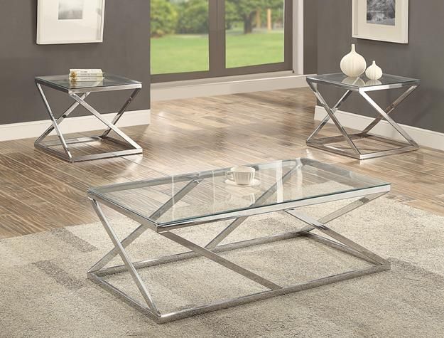 A living room with a glass coffee table and two end tables