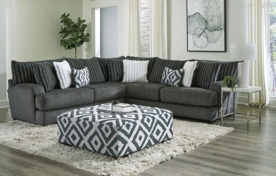 A living room with a sectional couch