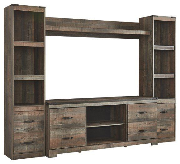 A wooden entertainment center with shelves and drawers