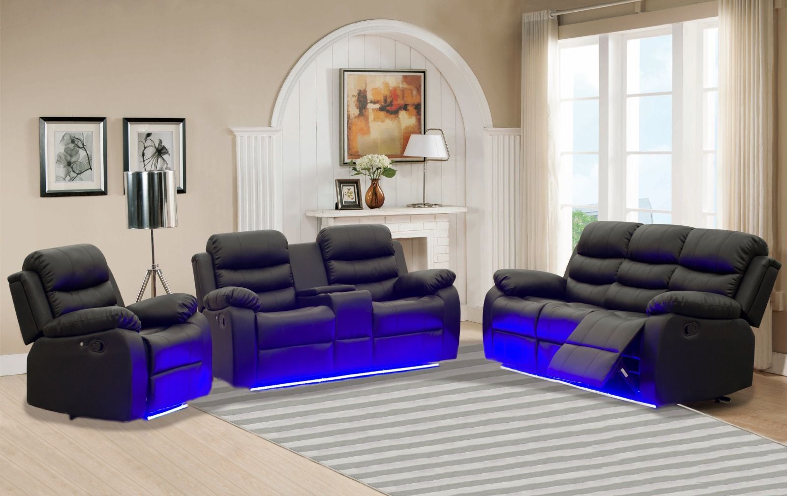 A living room with a couch , two chairs , and a rug.