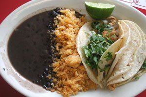 Chicken tacos with rice and beans