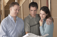 A happy couple seeing their house plan