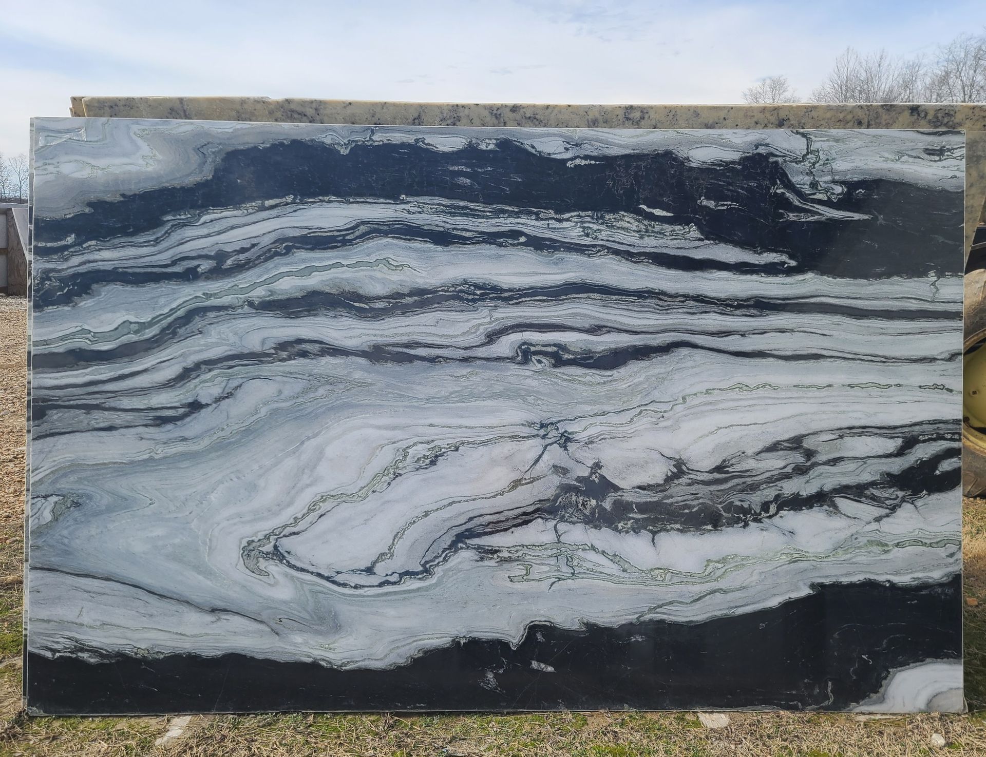 A black and white marble slab.