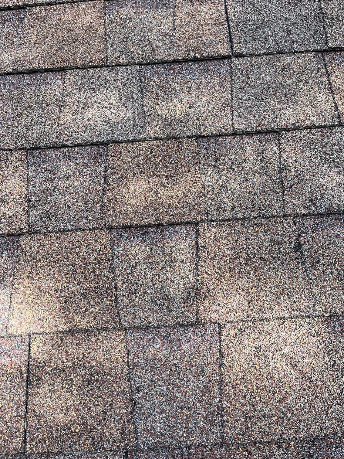 a close up of a roof with a lot of shingles on it