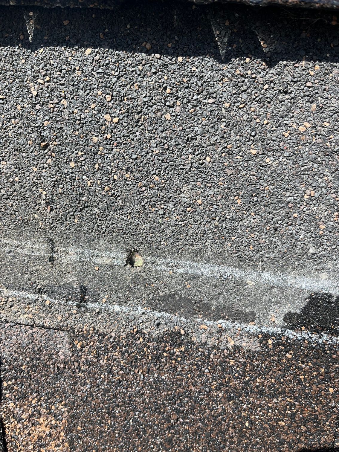 a close up of a piece of asphalt on a road