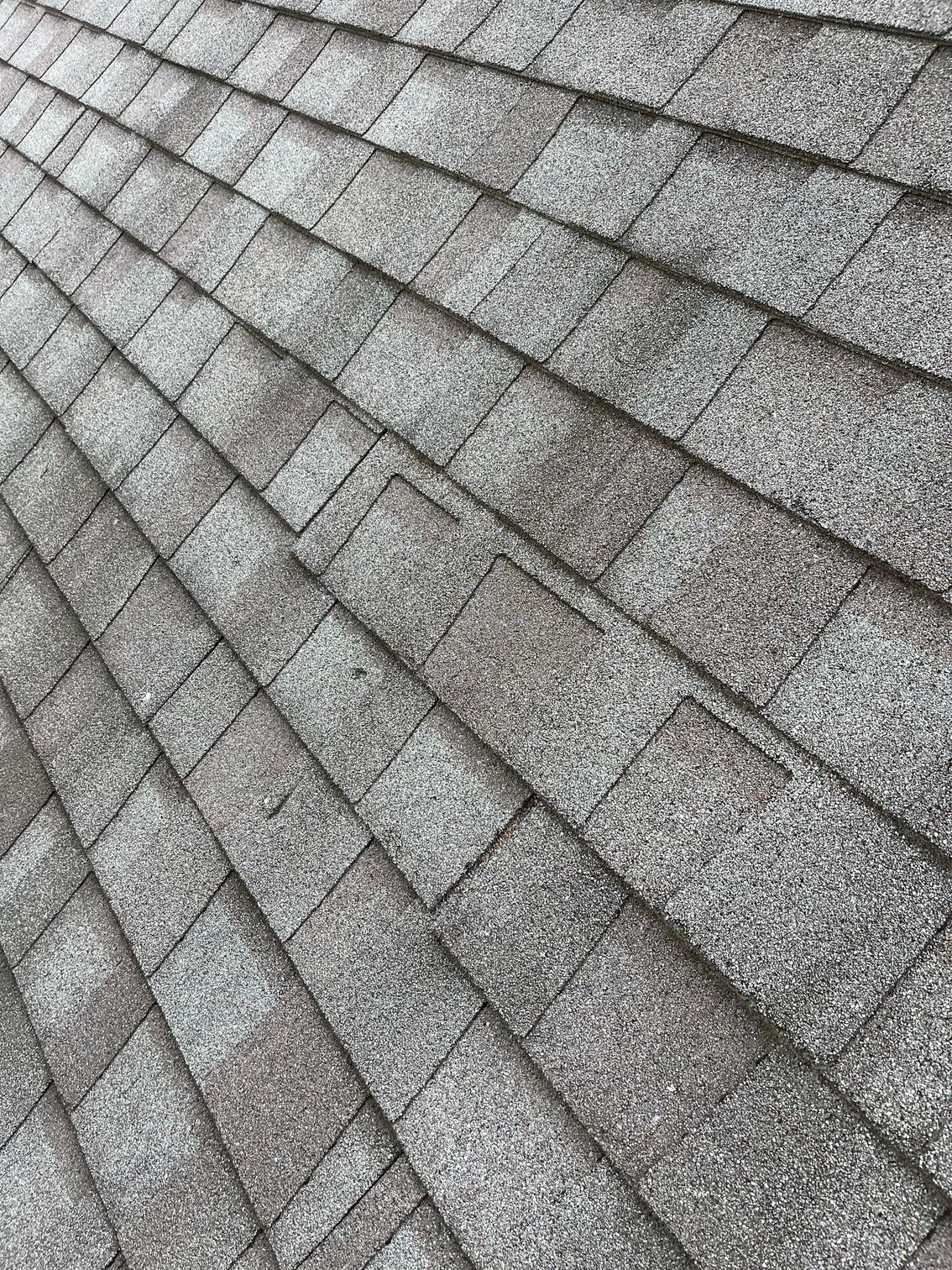 a close up of a roof with shingles on it
