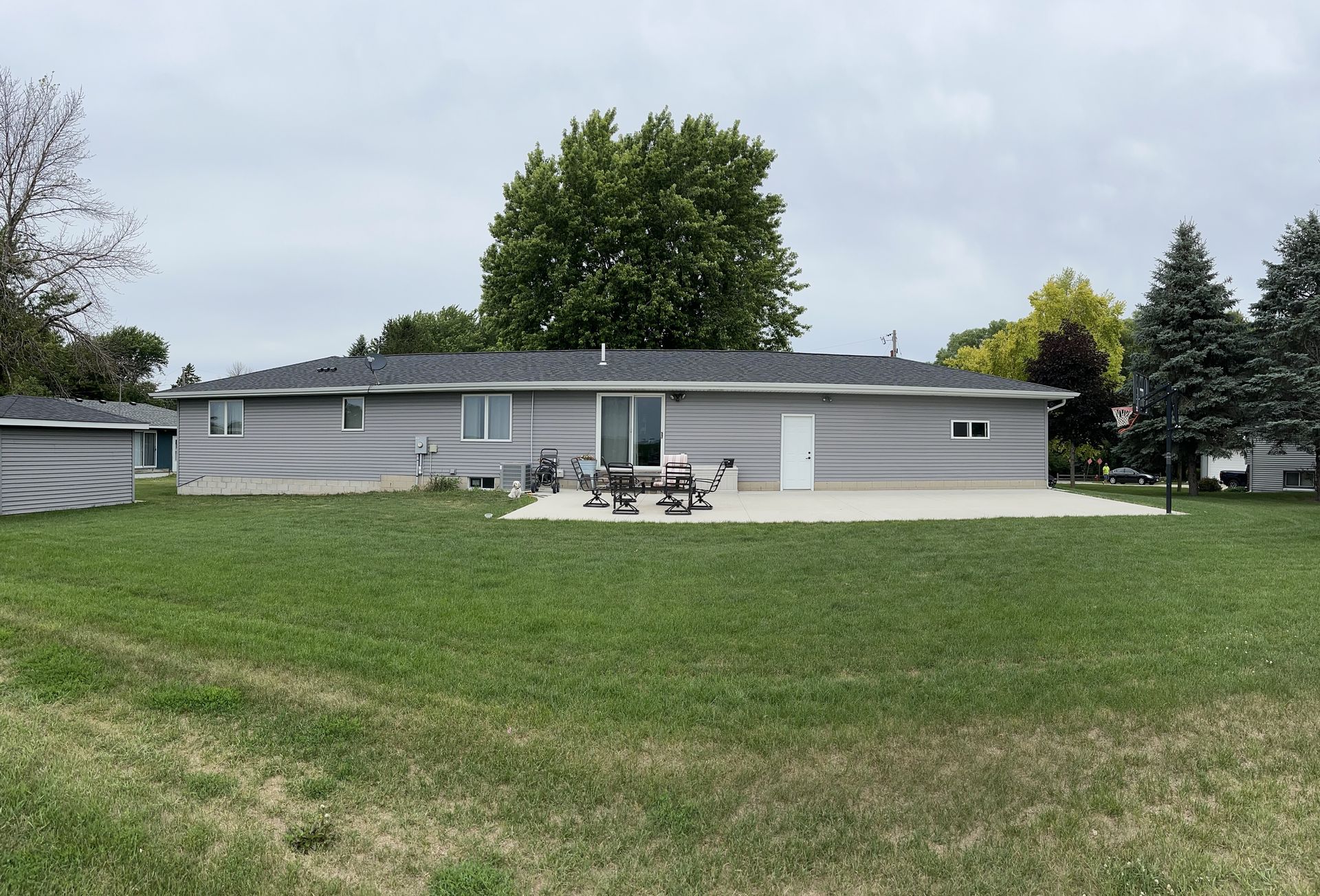 a house with a large lawn in front of it