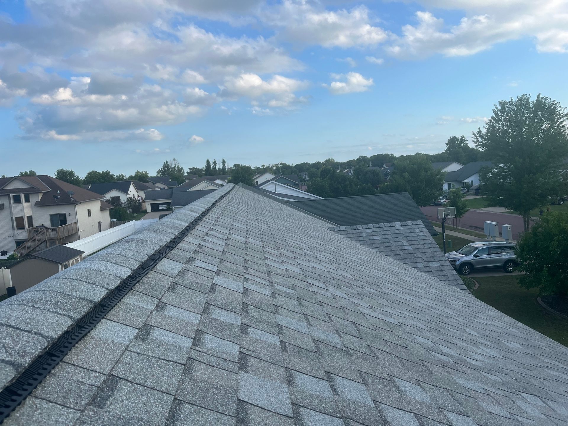 the roof of a house with a lot of shingles on it