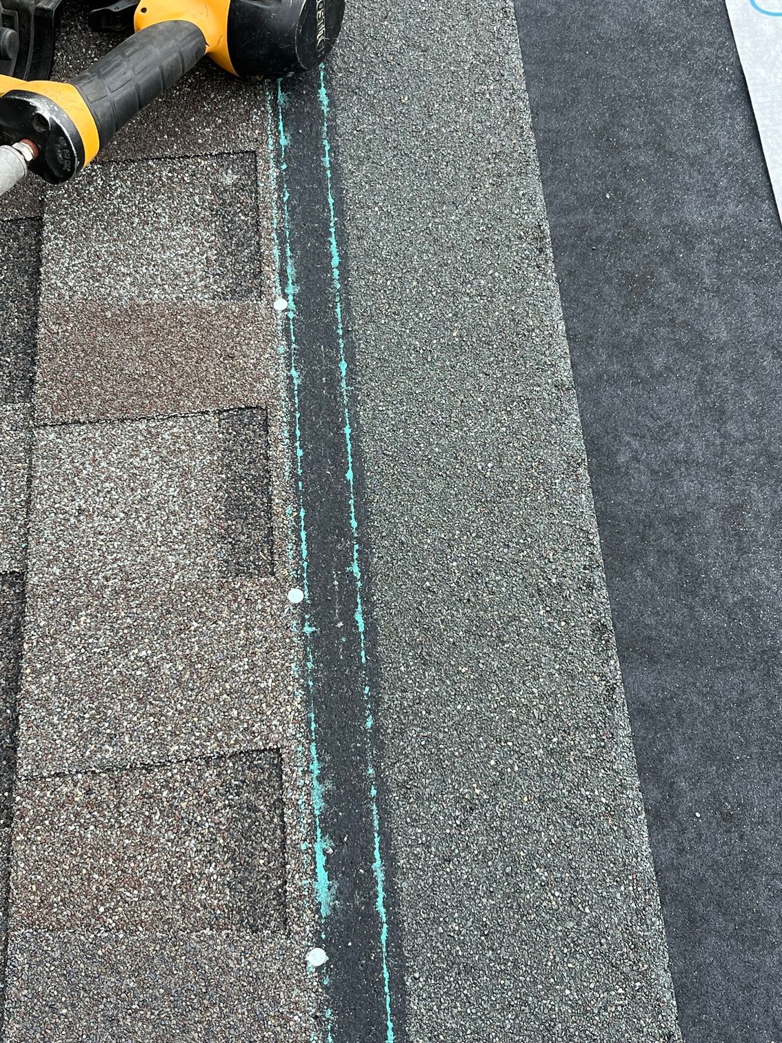 a close up of a roof with a tool on it