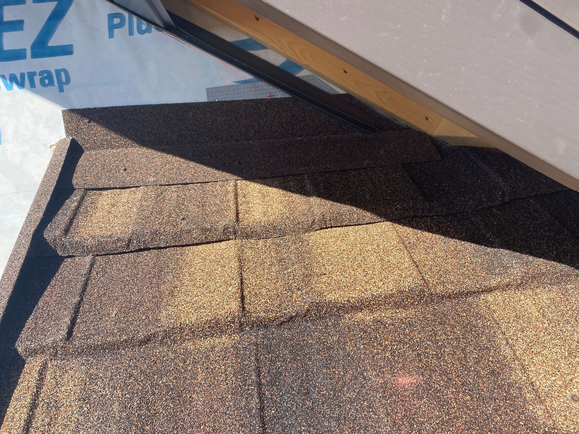 a roof with shingles