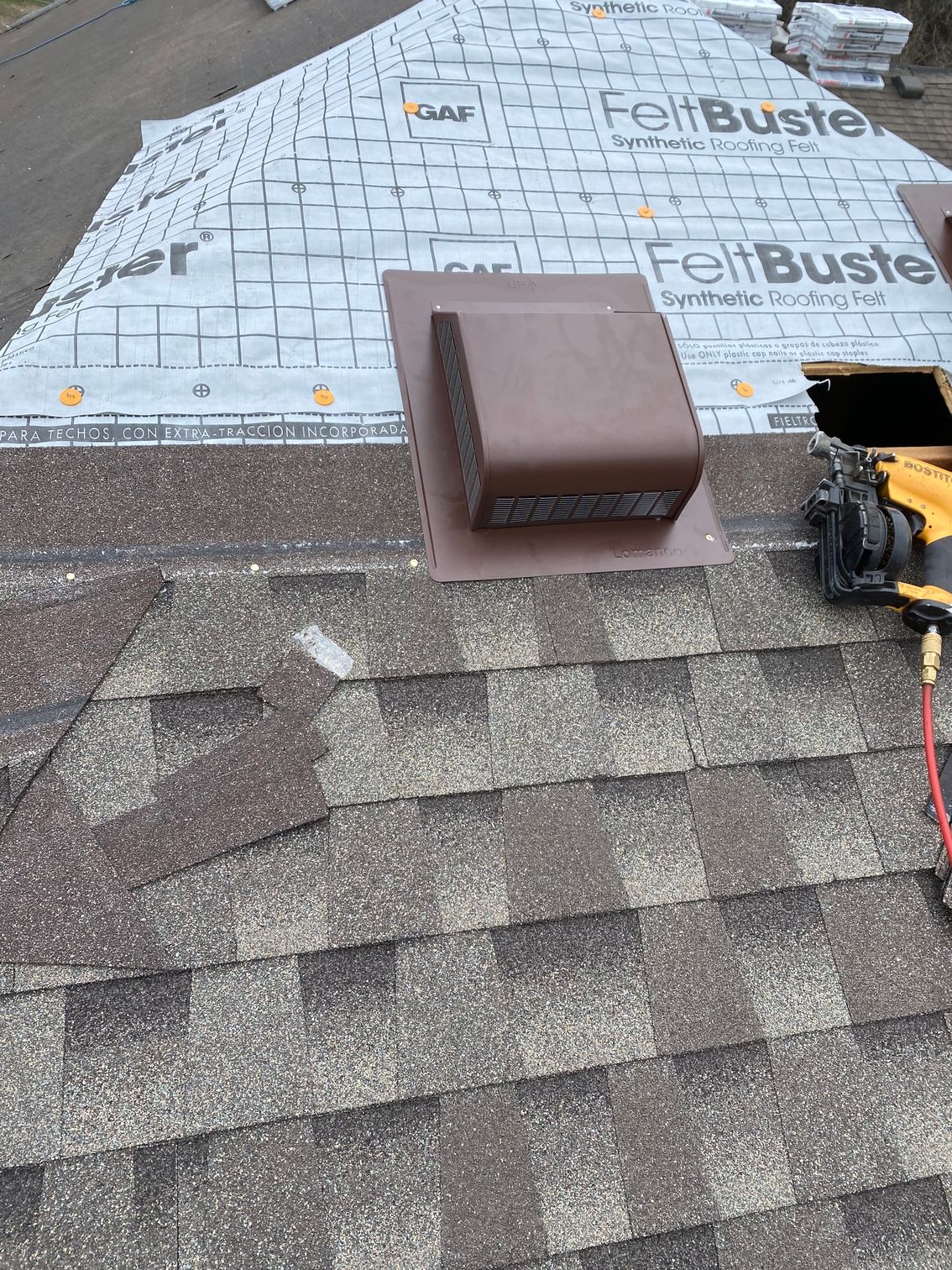 a shingle roofing installation