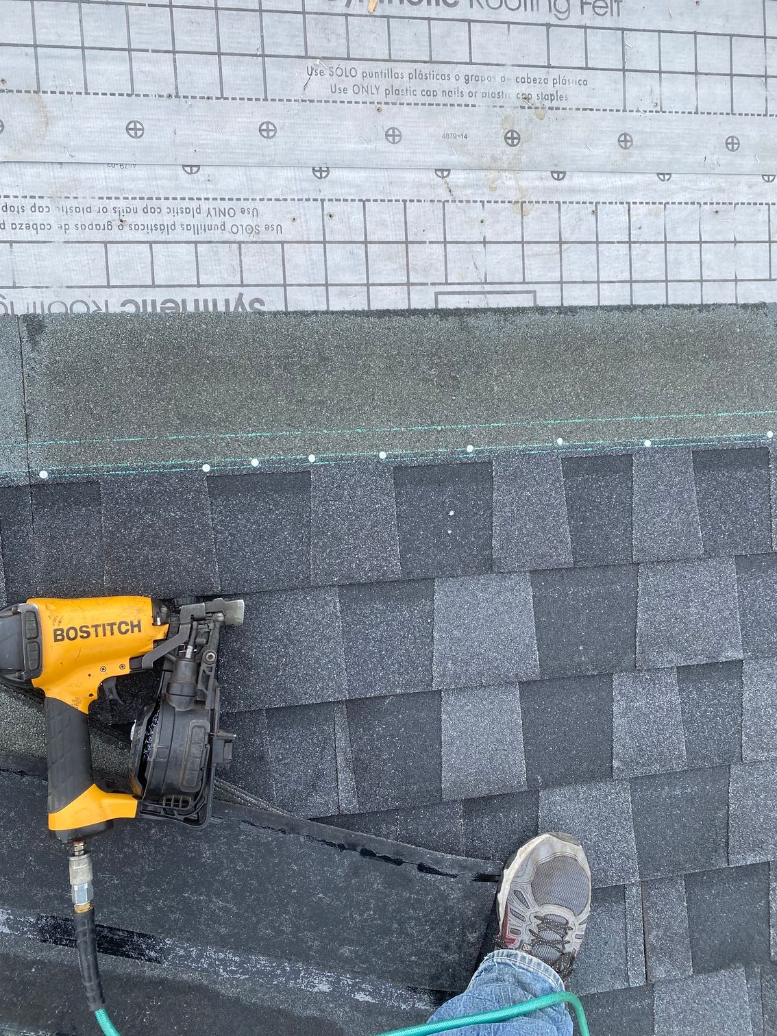 a close up of a roof with shingles on it