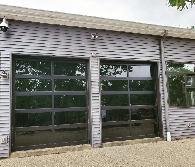 A garage door with a lot of windows on it