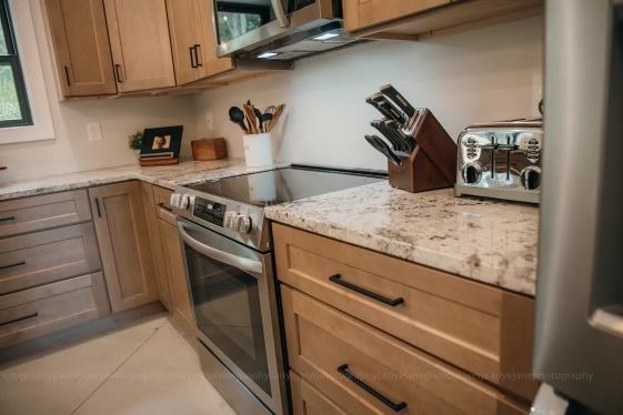 Granite counters on either side of rangetop