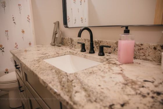 Granite counter in bathroom with basin