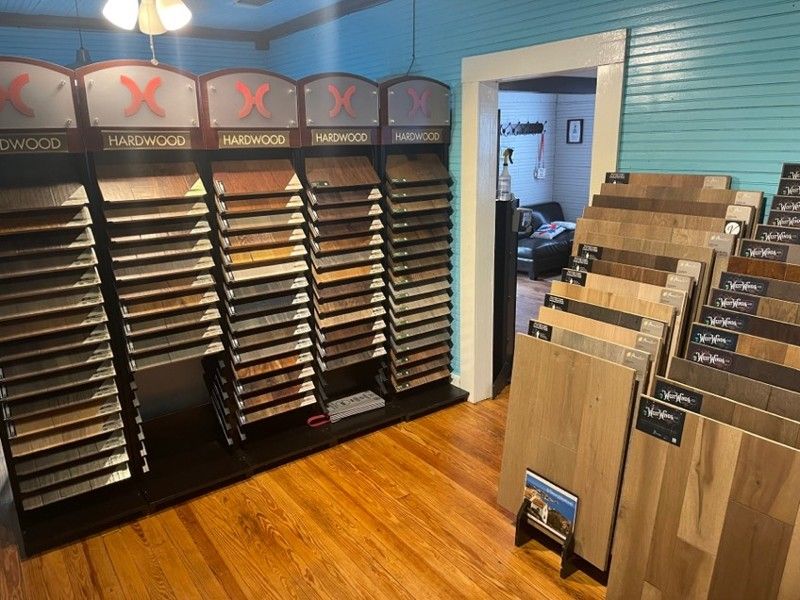 A room filled with lots of different types of wood flooring.