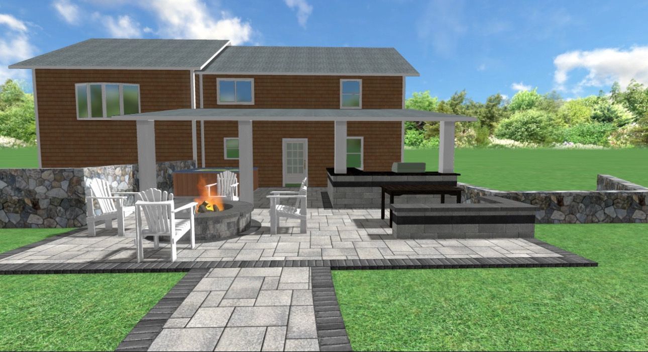 Backyard patio with fire pit, outdoor kitchen, and seating, against a house on a sunny day.