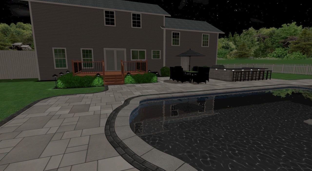 Night view of a house with a pool and patio. The house is brown, the pool is dark, and the sky is starry.