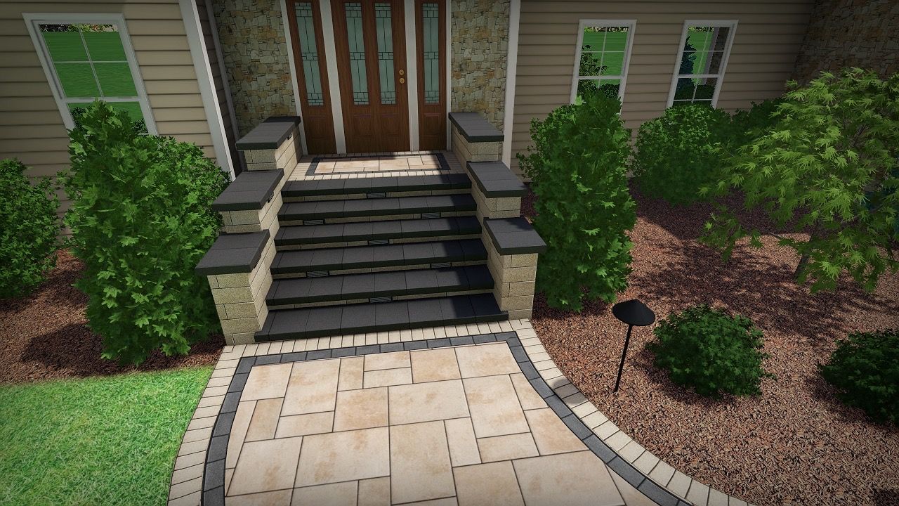 Stone walkway leading to the front door with steps; landscaping and bushes surround.