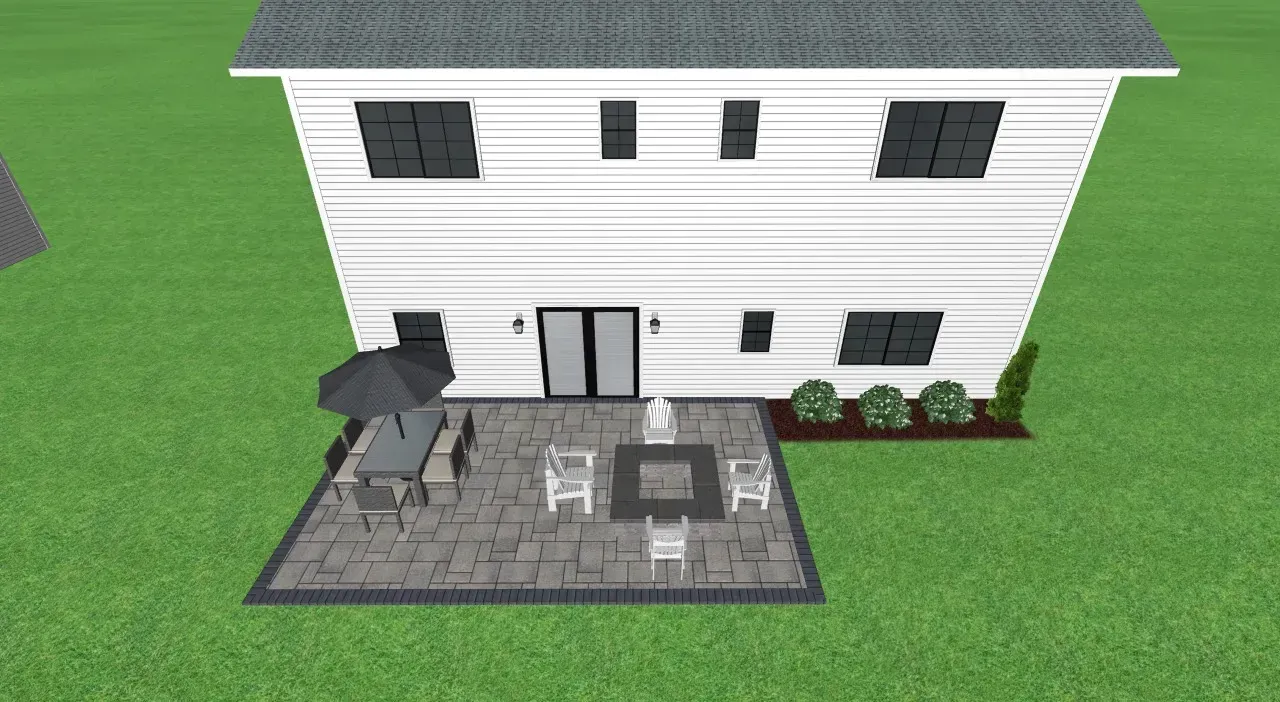 Back view of a white two-story house with patio furniture and a fire pit on a grassy lawn.