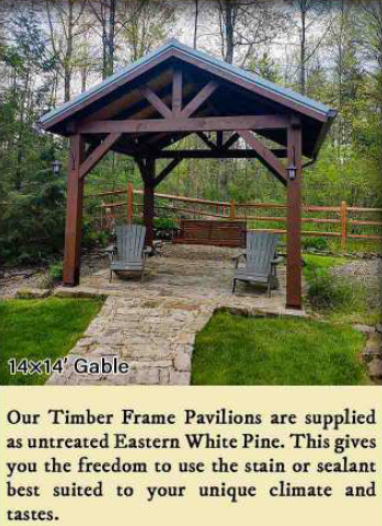 Wooden timber frame pavilion with peaked roof in a landscaped garden, with two chairs and a trash bin underneath