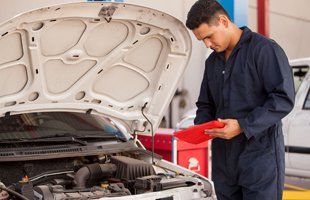 Mechanic repairing car's engine