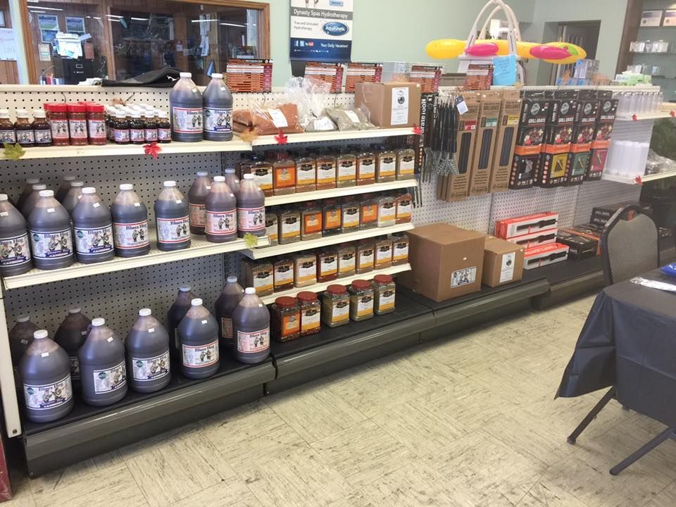 A store shelf filled with lots of bottles and boxes