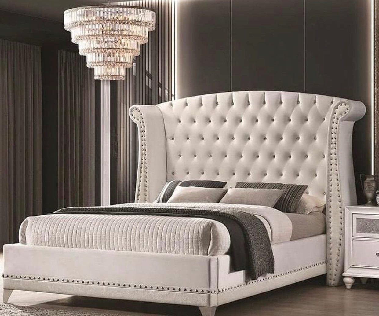 white bed frame tufted