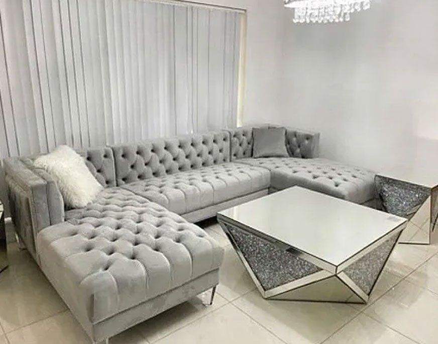 Gray sectional with chaise and geometric-shape table