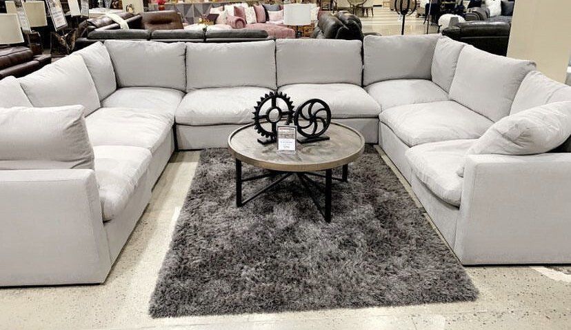 Off white fabric sectional with round table