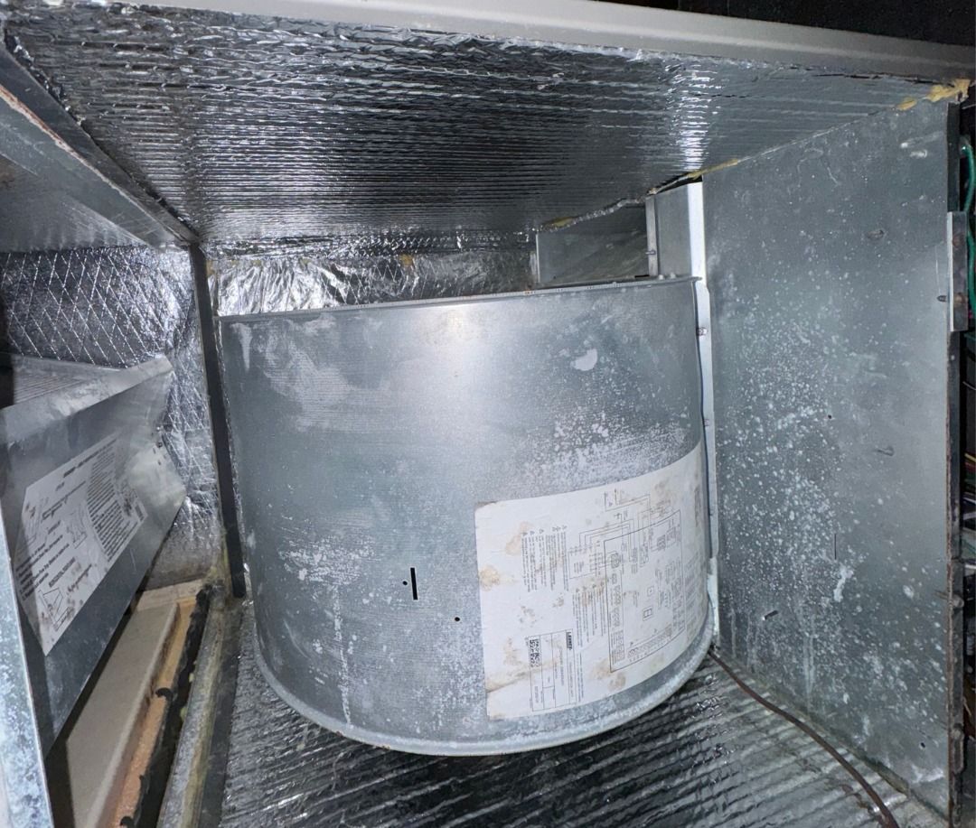 A metal cylinder with a label that says comfort control on it