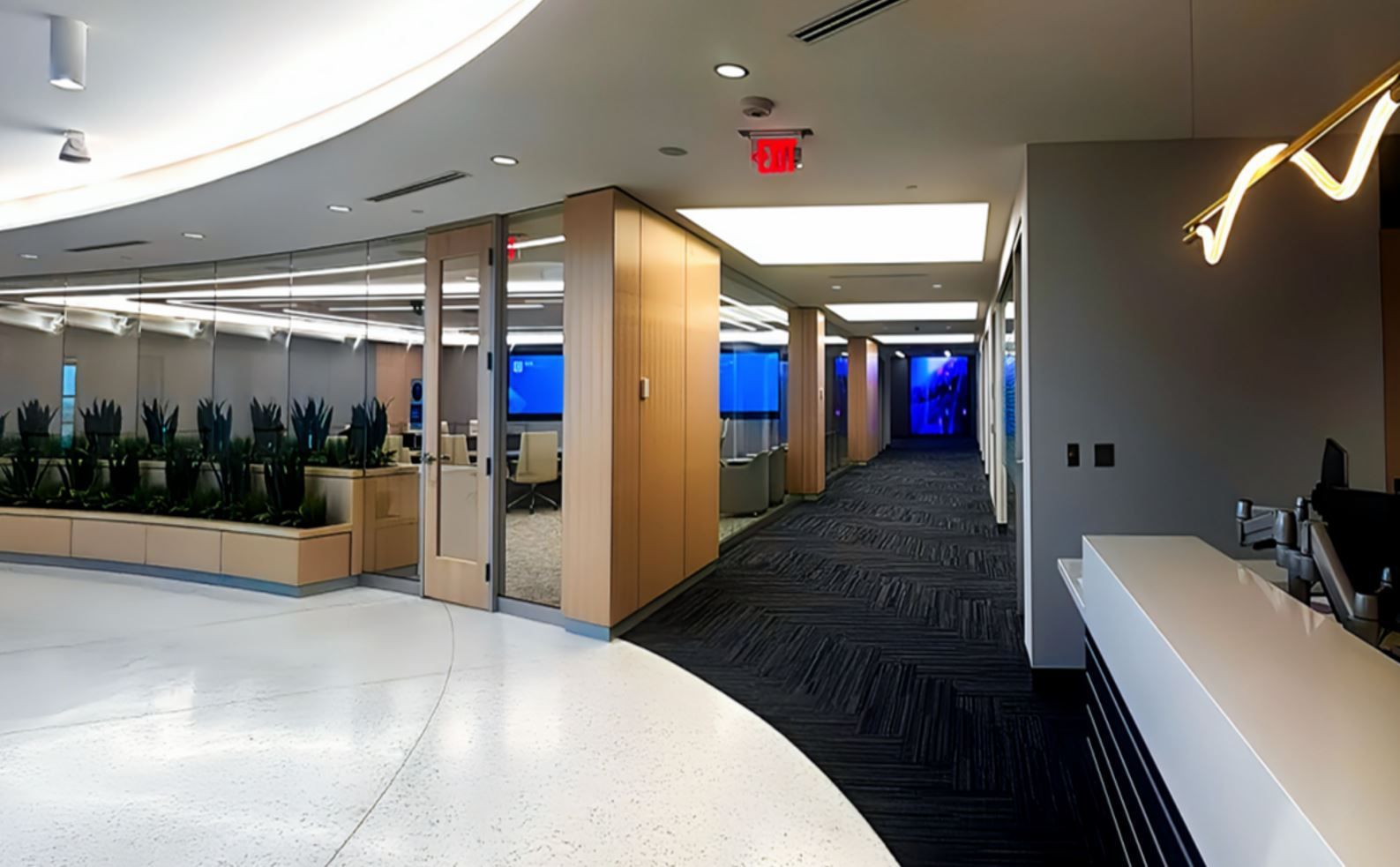 A Ceiling System with Purpose: Visual Impact and Acoustic Comfort for Boston Scientific's Arden Hills Executive Conference Room Hallway w l hall company 14