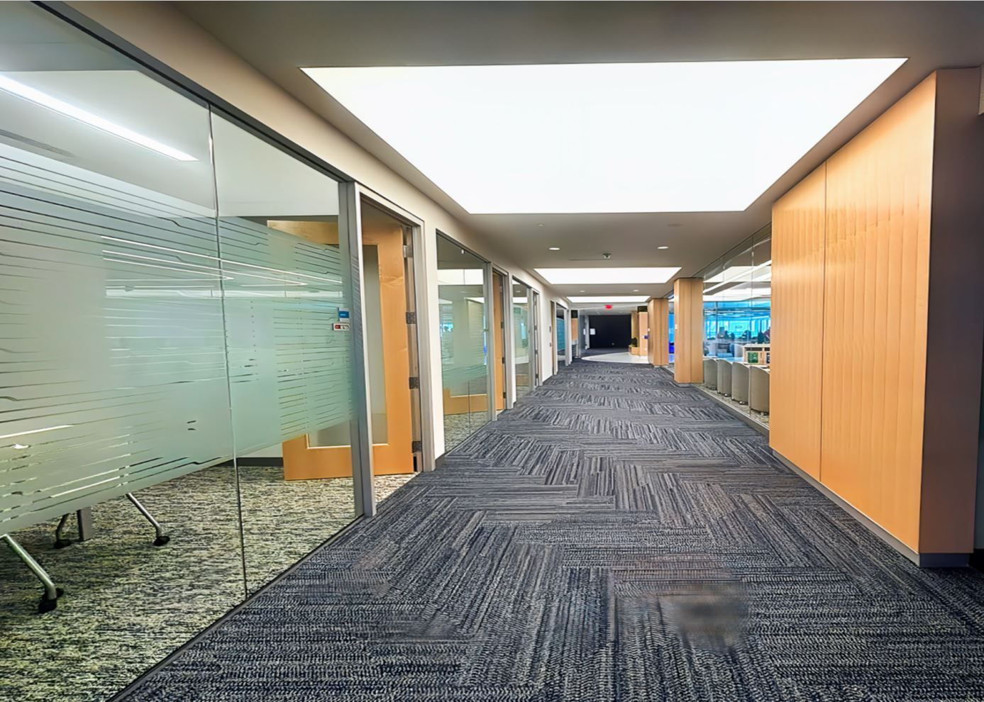 A Ceiling System with Purpose: Visual Impact and Acoustic Comfort for Boston Scientific's Arden Hills Executive Conference Room Hallway w l hall company 12