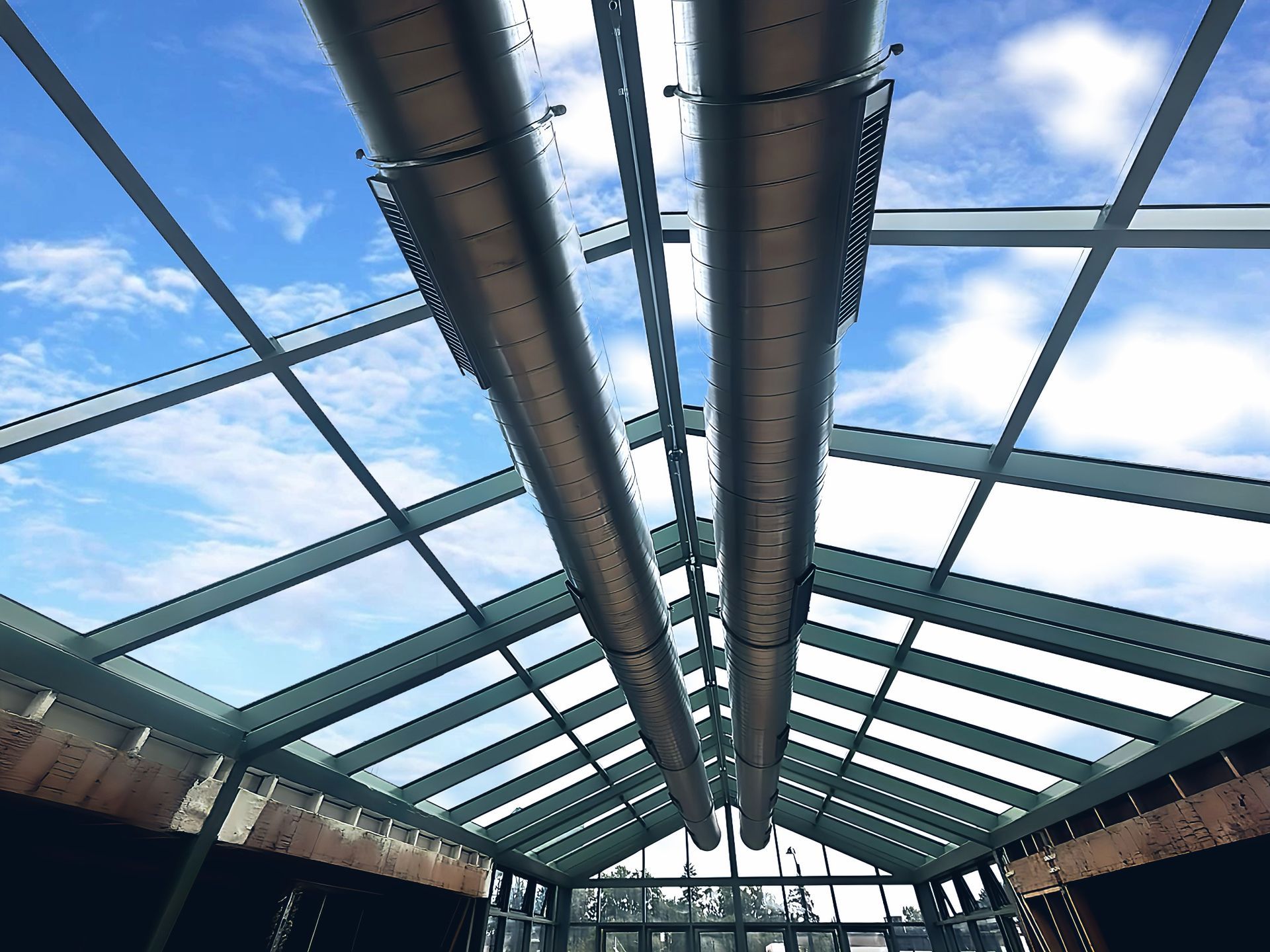 From Barrio to Bright & Bold — Americana Is Taking Shape at 50th & France w l hall company glass & glazing skylights curtainwall 15