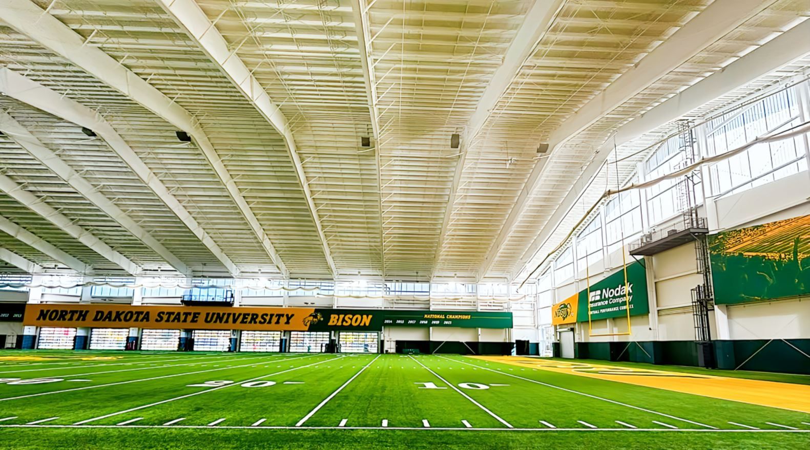 The Nodak Insurance Football Performance Complex serves as a state-of-the-art training facility for the North Dakota State University Bison, the newly crowned FCS National Champions. w l hall company 4