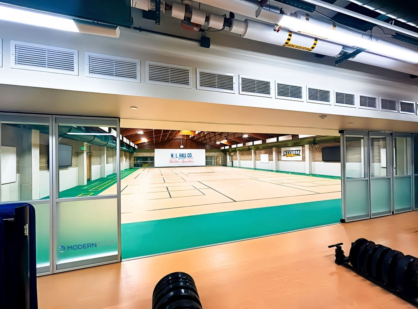 Modernfold Acousti-Clear Glass Wall Partitions for Sauk Rapids-Rice Middle School New Pickleball Courts w l hall company 1