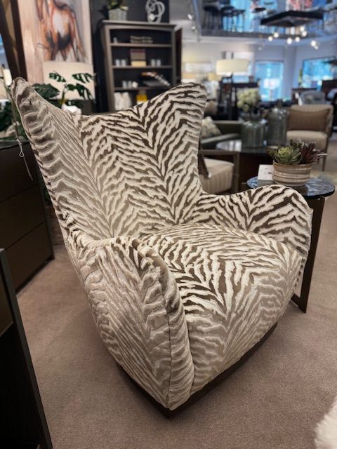 Zebra-patterned armchair in a showroom.