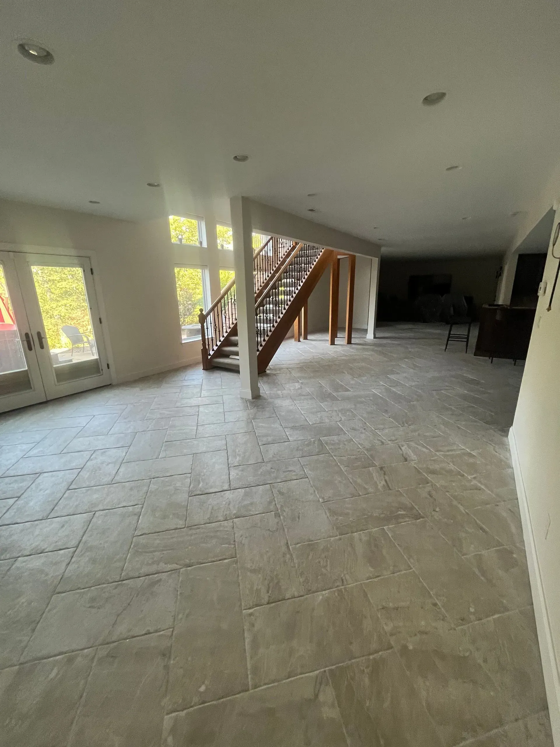 There is a staircase in the middle of the room.