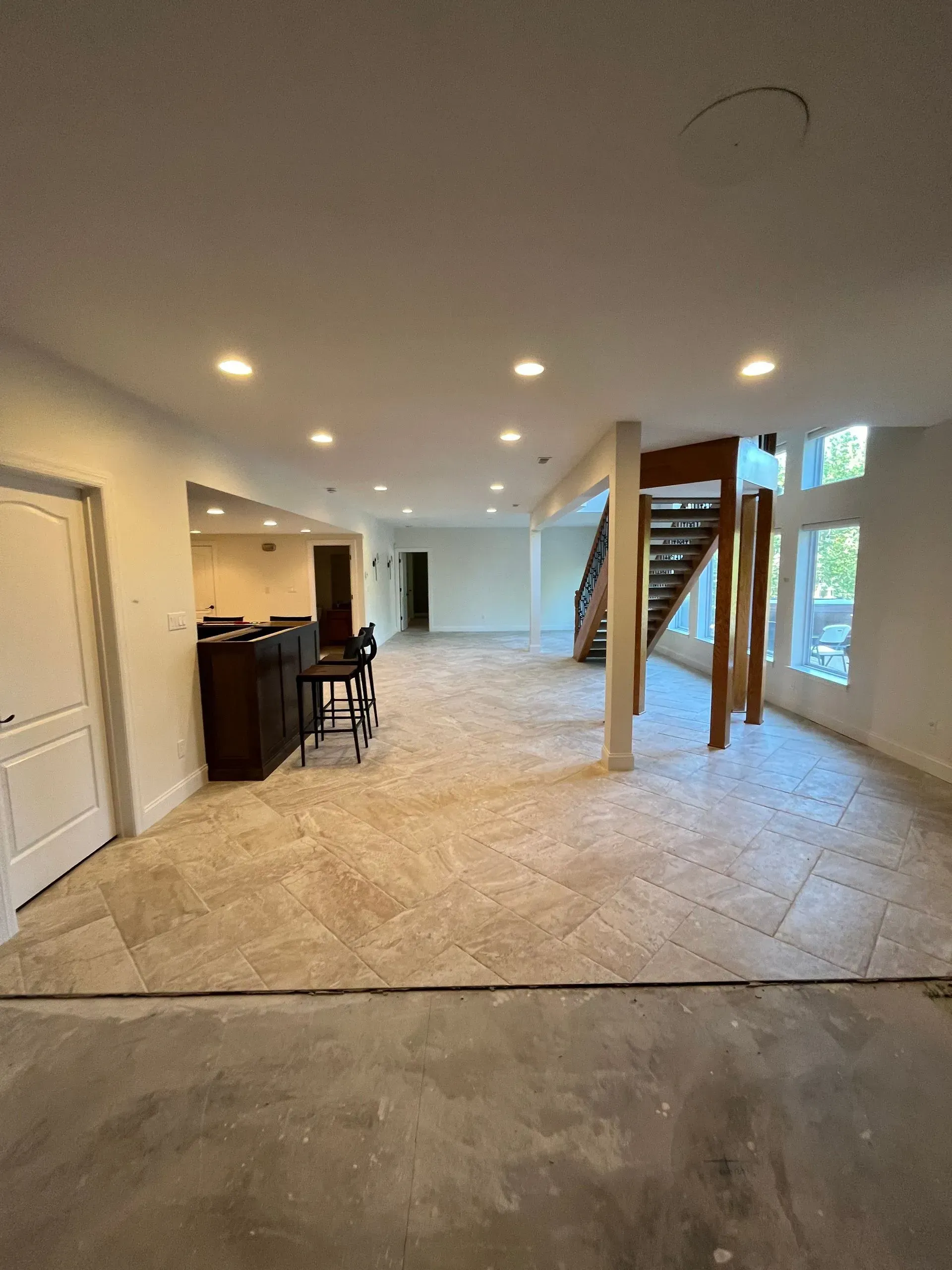 There is a staircase in the middle of the room.