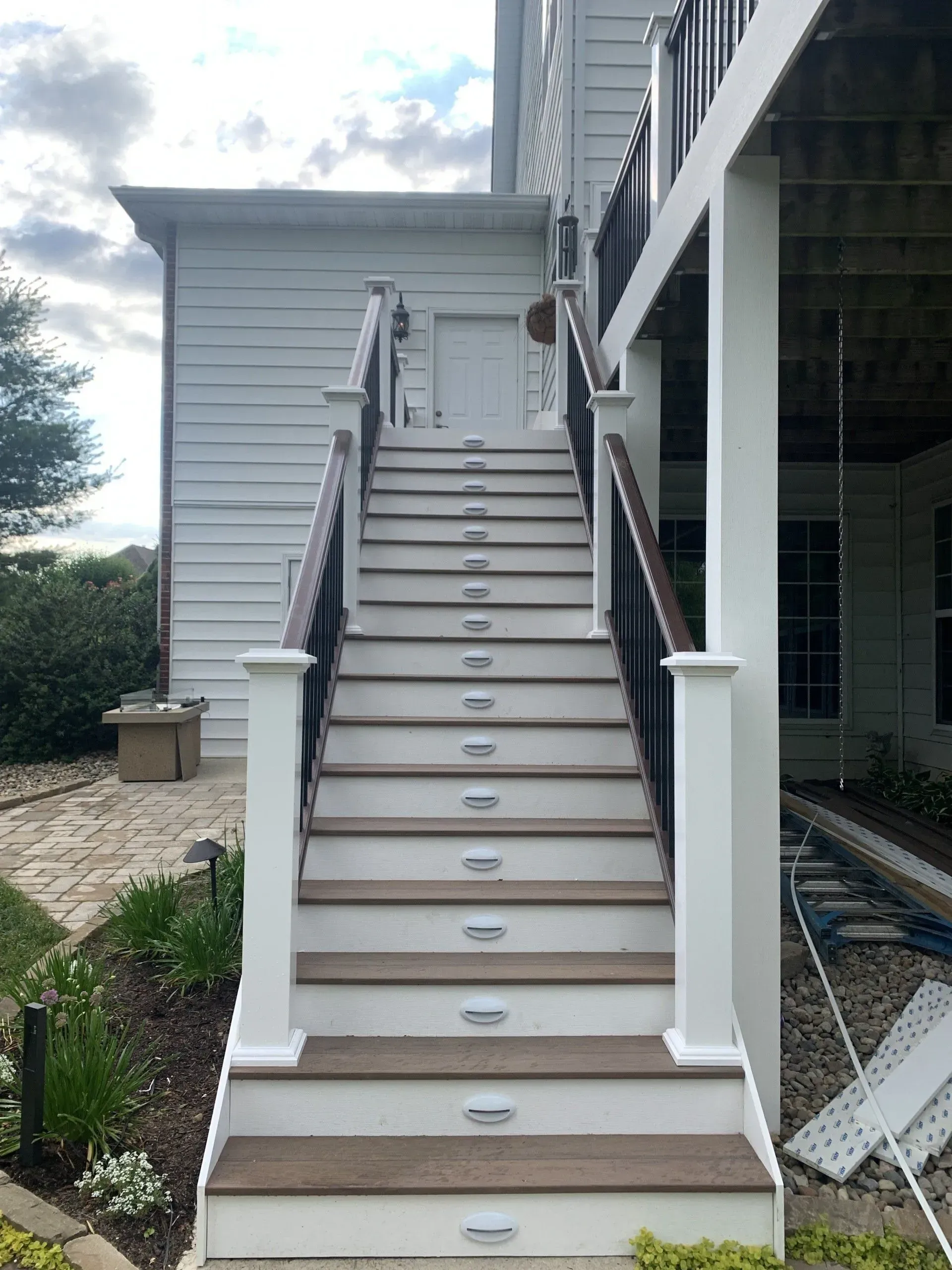 A set of stairs leading up to the second floor of a house.