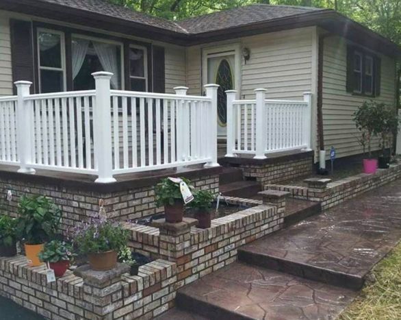 A house with a white porch and stairs